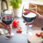 No, a glass of wine a day is not healthy